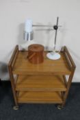 A teak serving trolley,