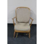 An Ercol spindle back armchair