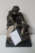 A bronze figure of two lovers on marble base