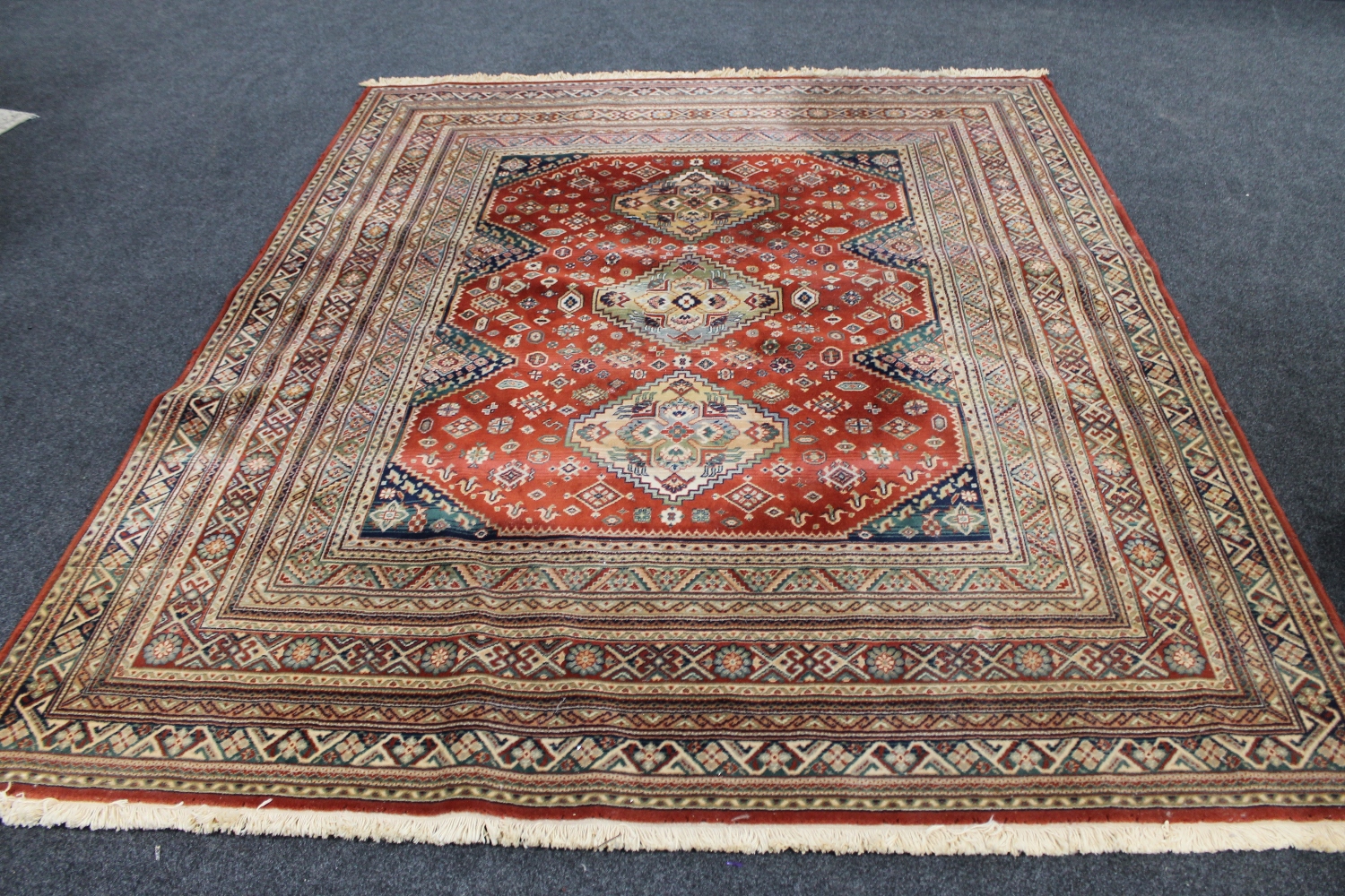 A machine made Persian carpet,