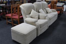 A contemporary three piece lounge suite comprising two seater settee,