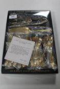 A Golden Rose collection 24 karat electroplated cutlery set, boxed.