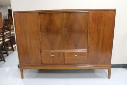 A mid 20th century continental walnut sideboard