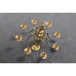 A brass eight-branch chandelier