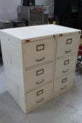 Two metal three drawer filing cabinets