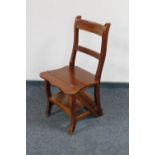 A folding library chair together with an oak school desk