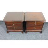 A pair of Stag Minstrel two drawer bedside chests