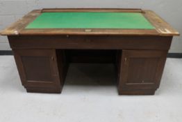 A mid 20th century oak desk