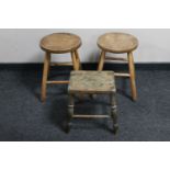An oak cracket and two stools