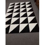 A contemporary black and white carpet,