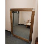 A contemporary overmantel mirror 110 cm x 140 cm