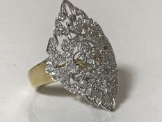 An 18ct gold diamond panel ring