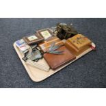 A tray containing miscellany including clock movement, a vintage ball game, leather cigar case,