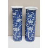 A pair of Chinese blue and white porcelain prunus-decorated sleeve vases,