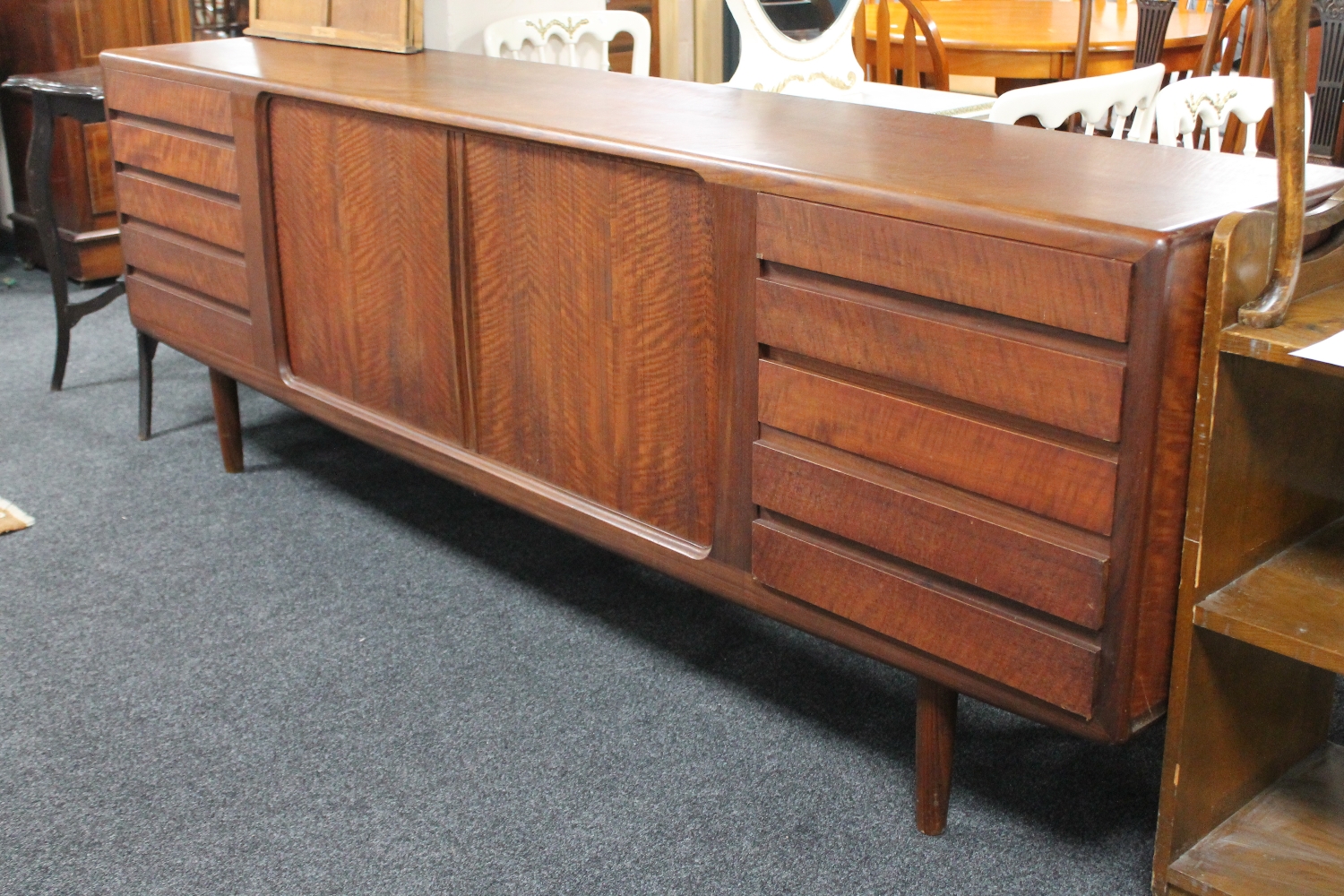 A mid 20th century teak Long John sideboard