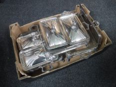 A box containing 20th century plated tureens with glass liners