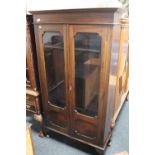 An Edwardian double door bookcase