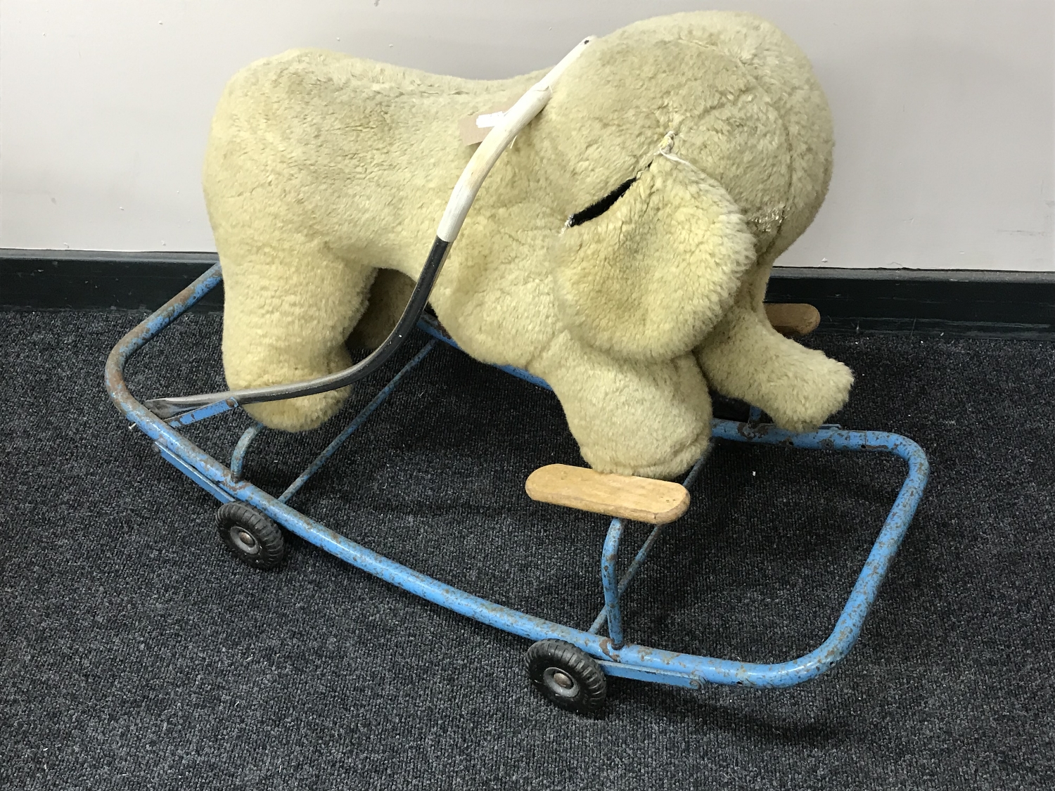 A mid 20th century push along elephant toy