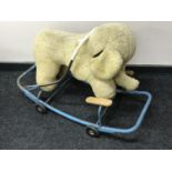 A mid 20th century push along elephant toy