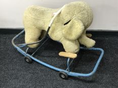 A mid 20th century push along elephant toy