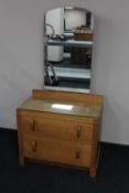 An oak Art Deco two drawer dressing chest