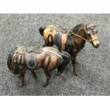 Two leather figures of horses