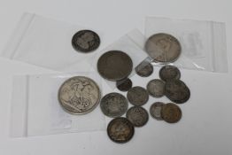 A group of Georgian and later coins including Victorian crown, double florin, A William III coin,