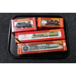 A tray of four boxed Hornby die cast locomotives including The Flying Scotsman and Manchester