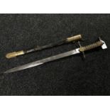 A George V naval officer's dirk in brass and leather scabbard with shagreen hilt