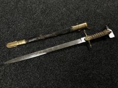 A George V naval officer's dirk in brass and leather scabbard with shagreen hilt