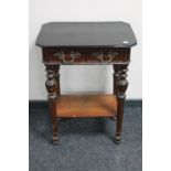 An antique continental mahogany two drawer side table with ornate handles