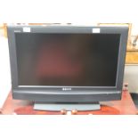 A Sony Bravia 26" LCD TV with remote