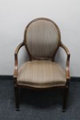 A 20th century continental mahogany armchair