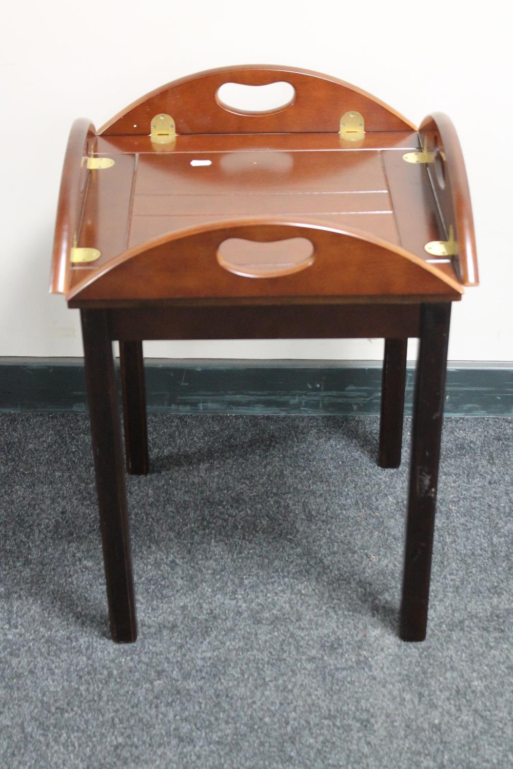 A mahogany butler's tray on stand