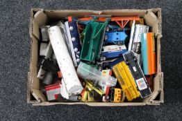 A box of 20th century play-worn die cast vehicles