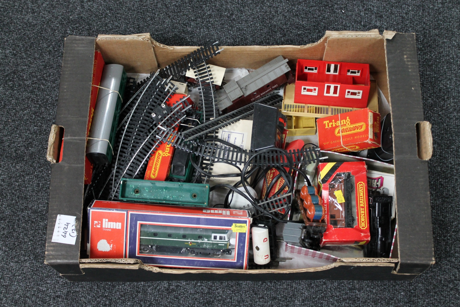 A box of Hornby Railways rolling stock, track and accessories,