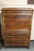 A 19th century continental mahogany secretaire cabinet,