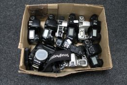 Ten assorted Nikon and Canon cameras