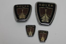 Four Rover car badges