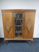 A 20th century continental oak sideboard with walnut panel doors