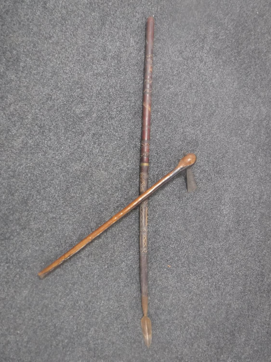 A tribal spear and axe
