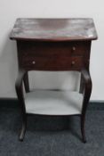 A continental mahogany side table on cabriole legs