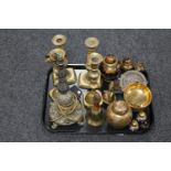 A tray of two pairs of brass candlesticks, ornate lamp base,