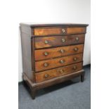 A 19th century continental oak five drawer chest