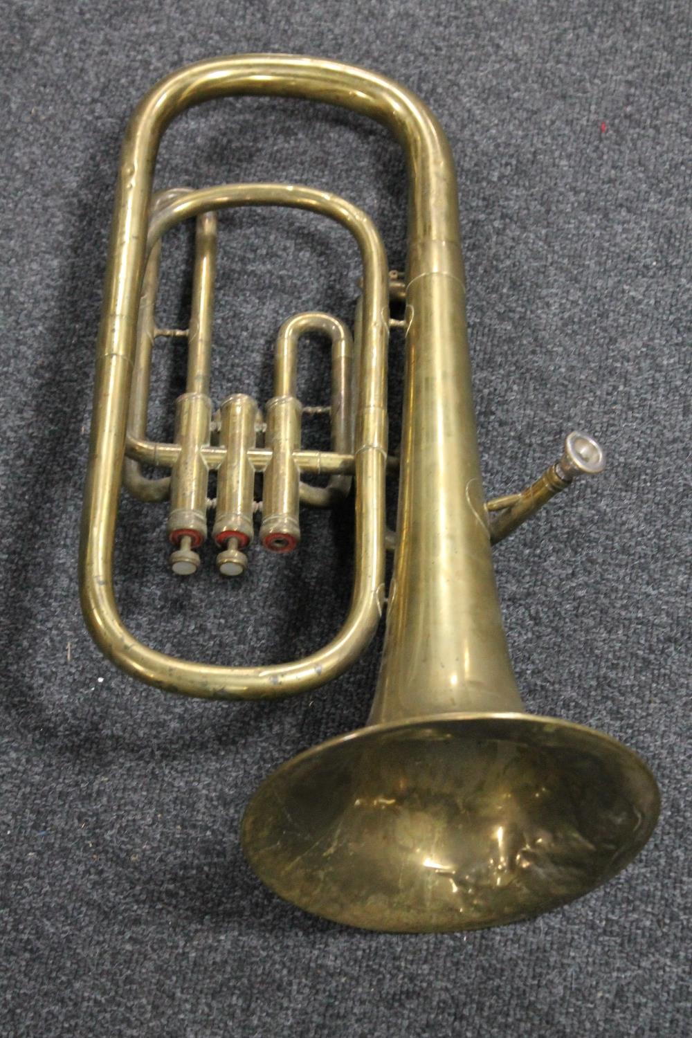 A brass tenor horn