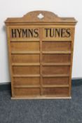 An oak church hymn board,