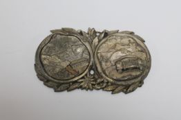 A vintage German car badge