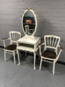 A white and gilt twin sided vanity table with mirror and two painted bentwood chairs