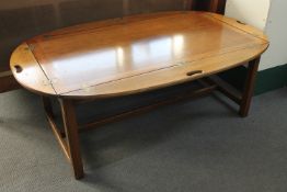 A mahogany butler's coffee table