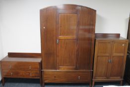 A three piece Edwardian inlaid mahogany bedroom suite